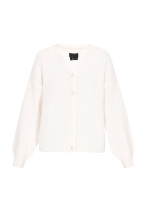 Valge kootud kardigan, millel on V-kaelus, pikad pallikujulised varrukad ja neli eesmist nööpi. Tekstuuriga kangas ribakujuliste mansettide ja äärisega.