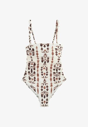 Fehér egyrészes fürdőruha barna, függőleges virág- és geometrikus mintákkal, keskeny vállpántokkal.
