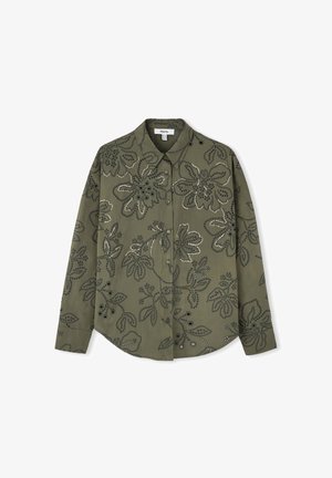 Camicia verde oliva con ricami floreali e dettagli di perline. Presenta una chiusura con bottoni frontale, maniche lunghe e un tessuto strutturato.