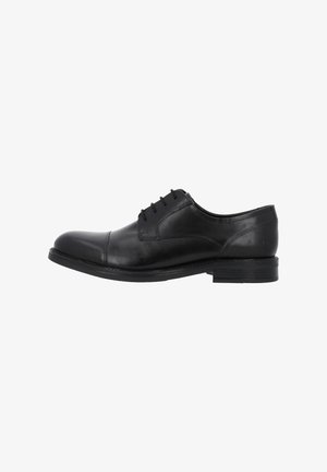 Scarpa da cerimonia in pelle nera con punta tonda, design con lacci, superficie liscia e tacco basso impilato.