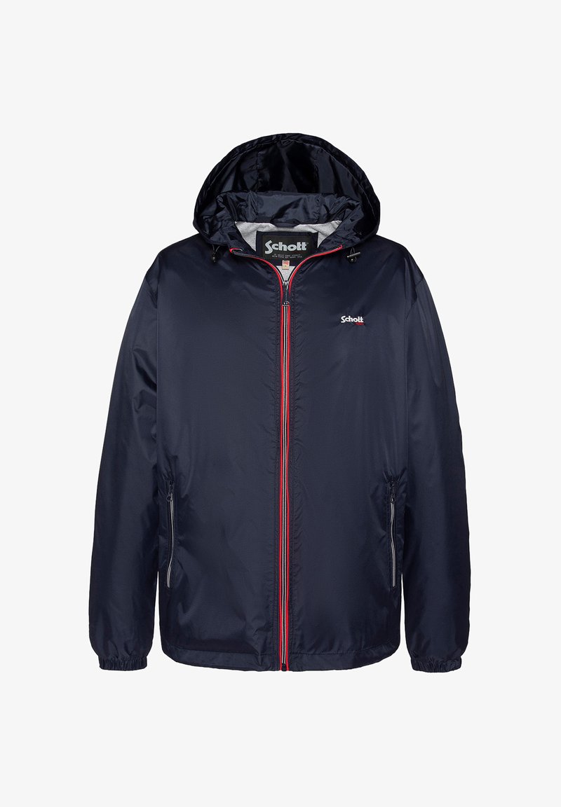 Veste coupe-vent navy avec capuche, fermeture éclair rouge et logo. Elle comporte deux poches latérales et une texture lisse et légère.