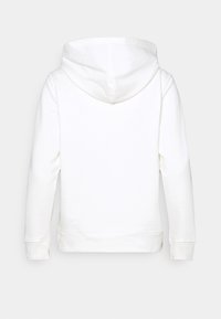 Felpa bianca in cotone con tasca a marsupio frontale, polsini a coste e una consistenza morbida. Presenta un cappuccio foderato con un design arrotondato.