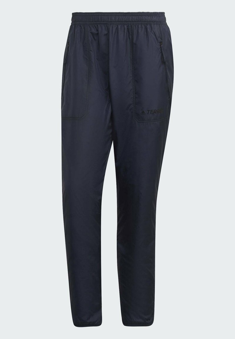 Pantalones ligeros de color navy con cintura elástica, dos bolsillos laterales y el logo de la marca impreso en negro. Textura suave y diseño ajustado.