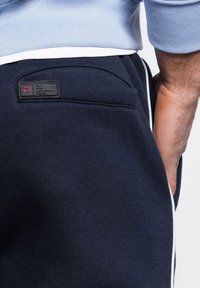 Ombre JOGGERS OM-PASK - Teplákové kalhoty - navy