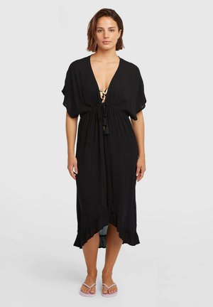 Robe kaftan noire avec un décolleté en V profond, fermeture à nouer à la taille et ourlet à volants. Fabriquée en tissu léger avec une coupe décontractée.