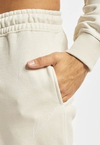 Rockamora HERREN ATLANTA - Jogginghose - offwhite