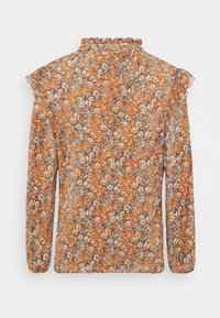 Långärmad blus i genomskinligt tyg med ett blomstertryck i orange, lila och beige nyanser. Volangkrage och axlar, lätt textur.