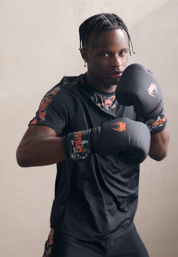 JUNGLE - Sports T-shirt