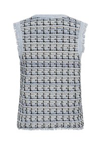 Haut sans manches avec un motif tissé bleu clair et noir, orné de franges le long de l'encolure et de l'ourlet. Tissu texturé avec un motif à carreaux.