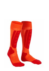 Calze fino al ginocchio di un brillante arancione con accenti rossi e marchio FALKE. Presentano un design a coste e pannelli testurizzati per supporto.
