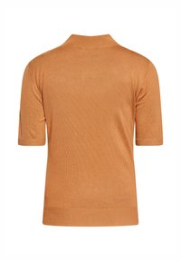 Oranssi lyhythihainen neulepaita, jossa on ribbireunus kauluksessa ja helmassa, sileä pinta ja klassinen, hyvä istuvuus.
