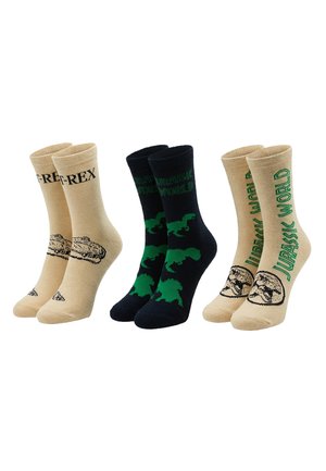 Drei Paar Sportsocken mit Jurassic World Designs: beige mit dem Text "T-REX", schwarz mit grünen Dinosaurier-Silhouetten und beige mit grünem "Jurassic World"-Schriftzug.