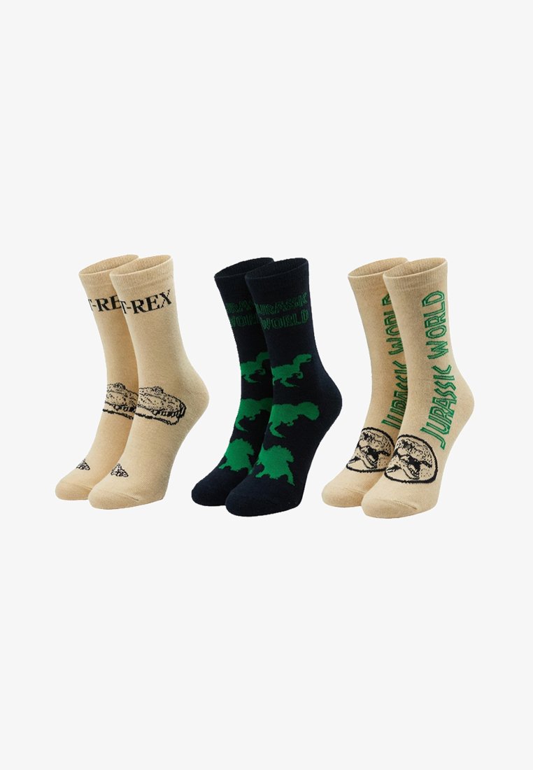 Three pairs of crew socks with Jurassic World designs: beige with "T-REX" text, black with green dinosaur silhouettes, and beige with green "Jurassic World" text.