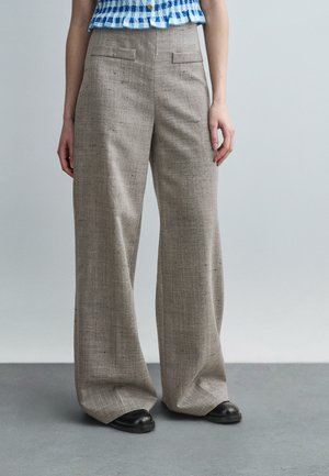 - Spodnie materiałowe