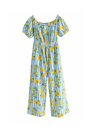 Jumpsuit rayé bleu et blanc avec un motif de citrons et de fleurs, décolleté épaules nues, manches volumineuses, et taille élastiquée.