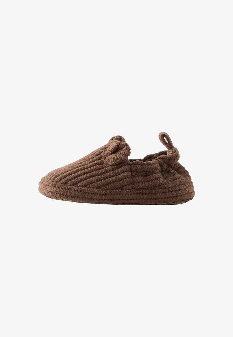 Brown corduroy baby slipper with bear ears on top and a loop on the heel for easy pulling on and off.