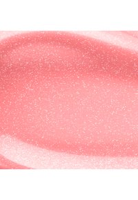 Glatt rosa Geltextur mit kleinen Glitzerpartikeln, die Lichtreflexionen und subtile wellenförmige Muster zeigen.