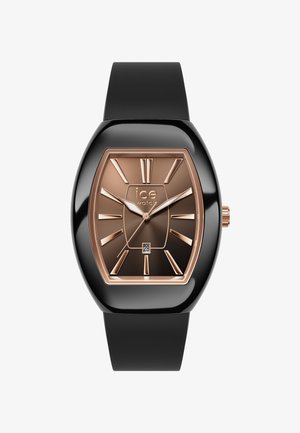 Zwarte ovale horloge met een glanzende afwerking, bronzen wijzerplaat, rechthoekige uurmarkeringen, datumaanduiding op 6 uur en een zwarte rubberen band.