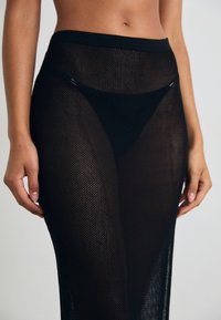 Calvin Klein Swimwear SKIRT - Complementos de playa - black