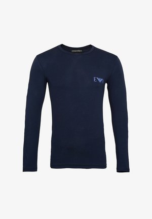 Navy Langarmshirt aus Baumwolle mit rundem Halsausschnitt und einem kleinen, tonalen gestickten Logo auf der Brust. Glatte Textur.