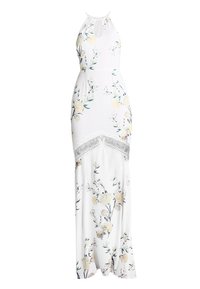 Abito maxi bianco con un motivo floreale in un delicato giallo e verde. Caratterizzato da una scollatura a halter e un accento in pizzo all'uncinetto in vita.