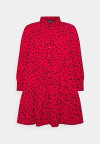 Red dress with long sleeves, button front, and black abstract pattern. Features a tiered skirt design and a collared neck.