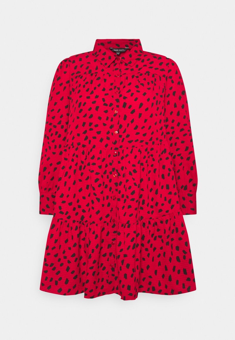Red dress with long sleeves, button front, and black abstract pattern. Features a tiered skirt design and a collared neck.
