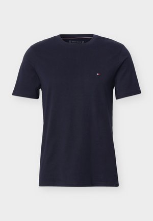 Donkerblauw T-shirt met korte mouwen en ronde hals, met een klein tricolor vlaglogo op de linkerborst.