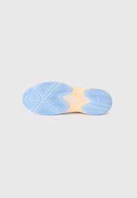 Shoe sole with a light blue rubber bottom, featuring a zigzag tread pattern and a peach-colored midsole, designed for traction and durability.