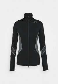 Black zip-up jacket with high collar, grey accent panels, thumbholes at cuffs, and a logo on the upper left side. Smooth, stretchy fabric.