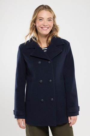 Marineblå dobbeltknappet frakke lavet af en uldblanding, med store knapper, bred krave og sidelommer. Klassisk peacoat design.