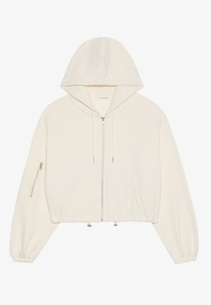 Gekürzter weißer Hoodie aus weichem Stoff mit einem vorderen Reißverschluss, Kordelzug und einer Reißverschlusstasche am Ärmel. Lange, voluminöse Ärmel.