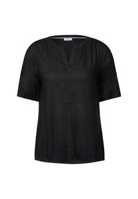 Blouse noire à manches courtes avec un col en V, texture lisse et détails froncés près des épaules. Tissu léger avec une coupe décontractée.