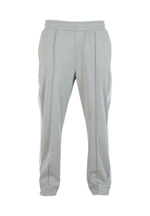 Pantaloni sportivi grigio chiaro con elastico in vita, gambe affusolate e strisce laterali. Realizzati in un tessuto leggero e liscio.