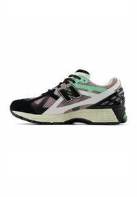 Black and pink mesh athletic shoes with white accents, textured black sole, and mint green details. Features a lace-up design and reinforced heel.