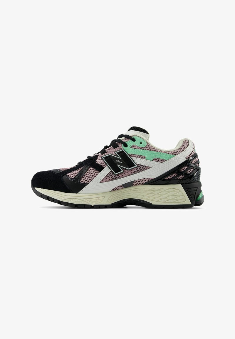 Black and pink mesh athletic shoes with white accents, textured black sole, and mint green details. Features a lace-up design and reinforced heel.