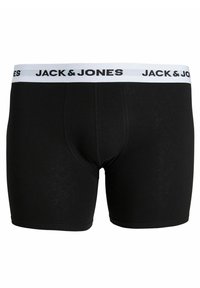 Svart boxertrosor gjorda av mjukt tyg. Har en vit elastisk midjeband med "JACK & JONES" tryckt i svart. Klassisk design, längd till mitten av låret.
