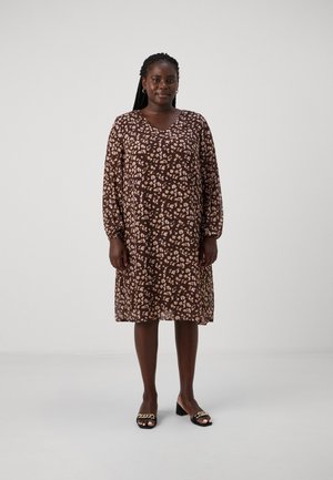 Brown floral dress with long sleeves, V-neckline, and loose fit. Features small pink flowers and a lightweight, textured fabric.
