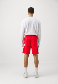 Nike Performance NBA MEMPHIS GRIZZLIES SHORTS - Športne kratke hlače - university red/light blue