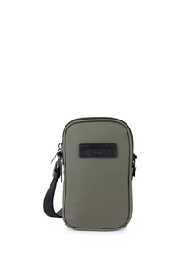 Borsa in tessuto verde con texture, con un accento in pelle nera, chiusura zip e tracolla nera removibile. Design rettangolare compatto.