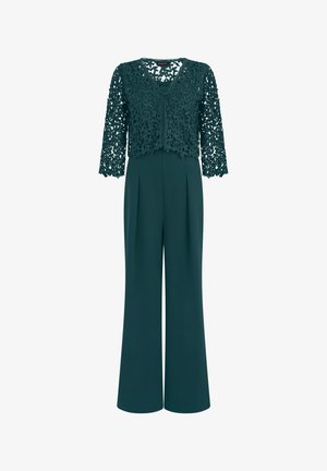 Mono de mujer verde oscuro con pantalones de pierna ancha y chaqueta corta de encaje floral con mangas tres cuartos y escote en V.