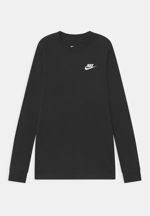 Camiseta negra de manga larga de Nike con cuello redondo, logo blanco de Nike y swoosh en el pecho izquierdo.