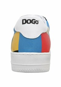Colorful sneaker with a white sole, featuring blue, yellow, and red sections. The back shows a white tab with "DOGO" branding. Smooth texture.