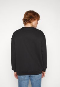 Levi's® GRAPHIC CREW - Camisola - mottled black