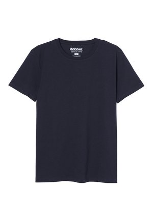 T-shirt en coton bleu marine avec un col ras du cou, des manches courtes et un ourlet droit. Présente une étiquette de marque blanche au niveau du col.