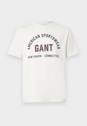 White short-sleeve T-shirt with "AMERICAN SPORTSWEAR," "GANT," and "NEW HAVEN - CONNECTICUT" printed on the front in black and red letters.