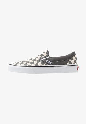 Niskie buty Vans slip-on z czarno-białym wzorem w kratkę z przodu, jednolitym ciemnoszarym obcasem i białą gumową podeszwą.