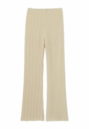 Pantalons larges en tricot de couleur beige clair avec un motif en côtes verticales, une taille élastique et des ourlets festonnés pour une finition texturée.
