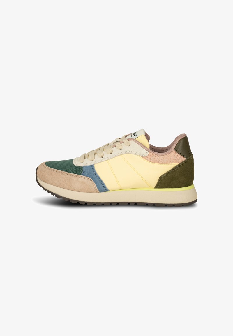 Multicolored sneaker featuring a combination of yellow, beige, green, and brown materials, with a textured back and rubber sole.