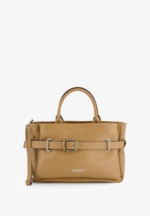 Tan leather handbag with a structured design, two top handles, a detachable shoulder strap, and a prominent silver buckle detail.